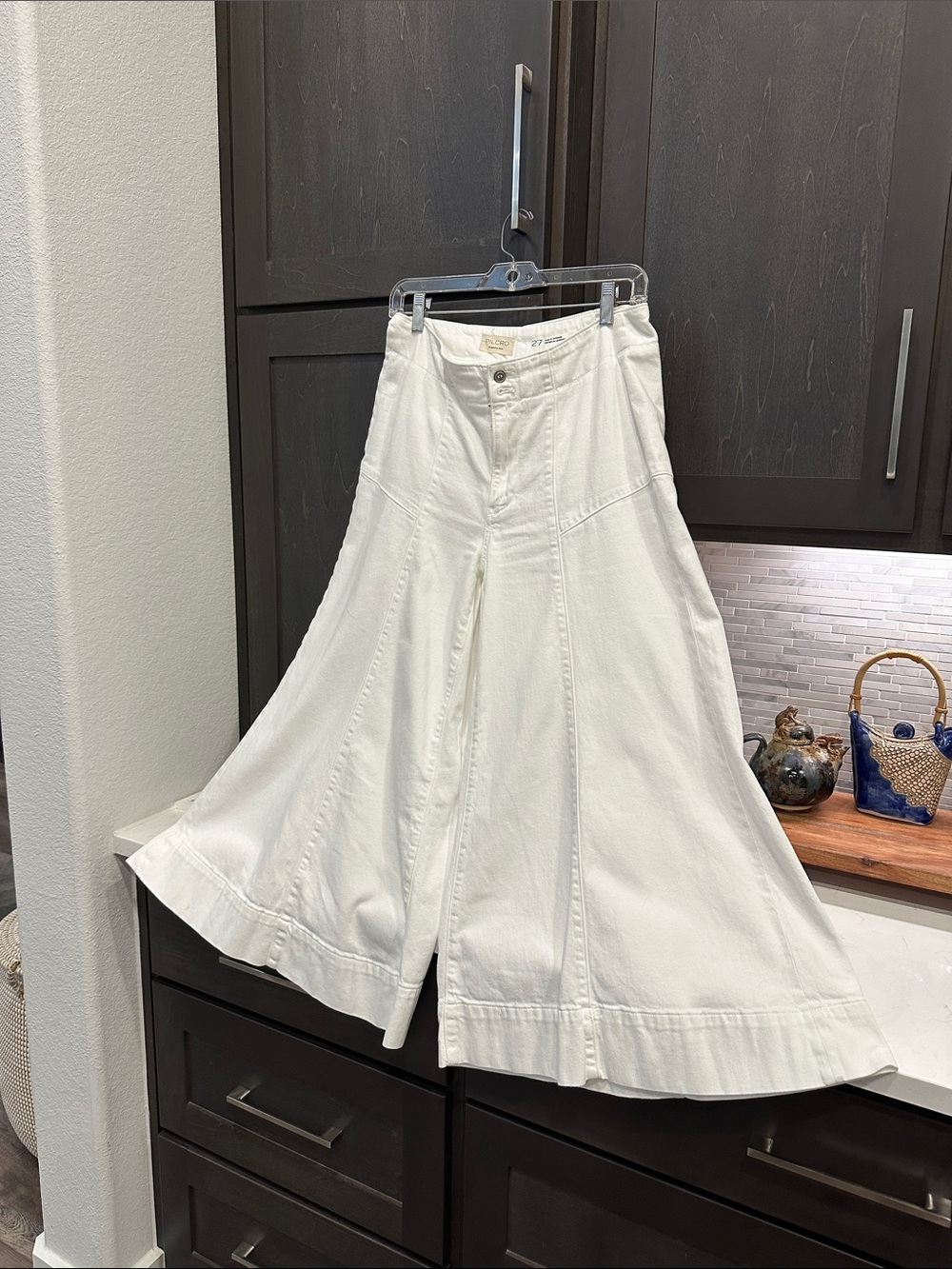 Pilcro White High-Rise Denim Jeans with Wide Flare leg.